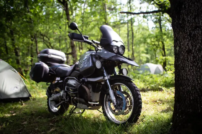 BMW R1150GS in forest camp